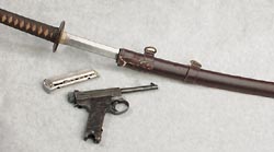 Pistol, magazine and a sword