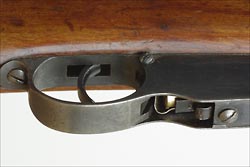 Magazine with slot for the charger